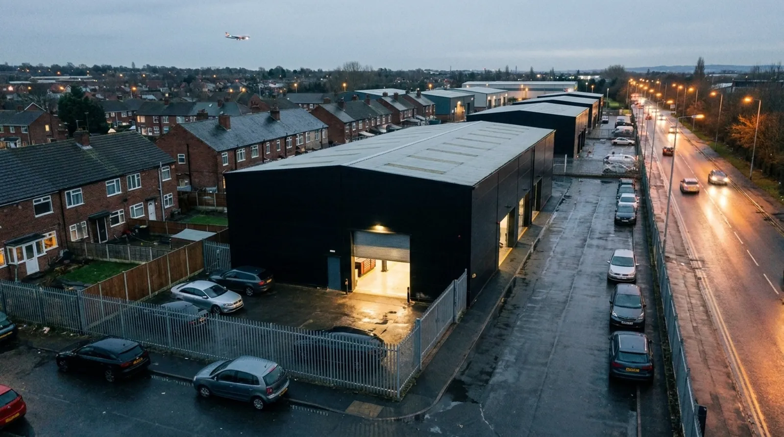 Aerial view of a workshop on a west London street at dusk